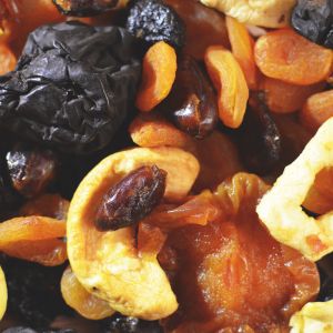 Close-up of a colorful mix of dried fruits and nuts, perfect for healthy snacking.
